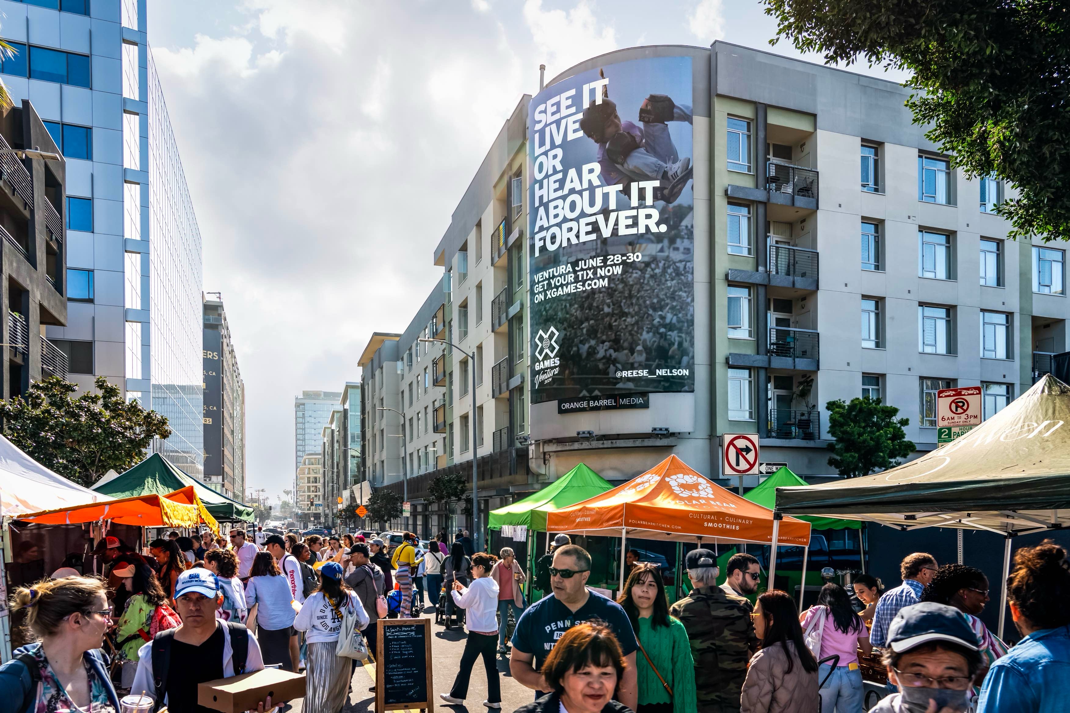 Ventura street scene with X Games 'See It Live Or Hear About It Forever' mural